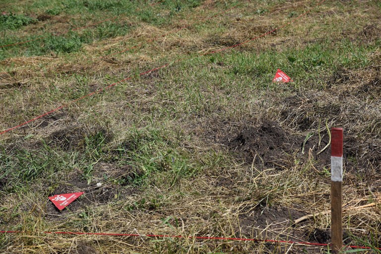 red triangle is placed on the ground