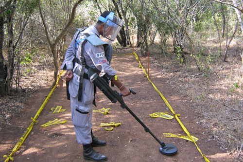 A deminer in Sri Lanka conducts quality control 