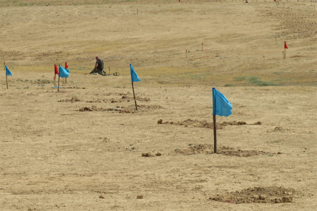 In-Iraq,-the-safe-and-non-safe-areas-of-the-minefields-are-marked-with-coloured-flags (Iraq,2021)