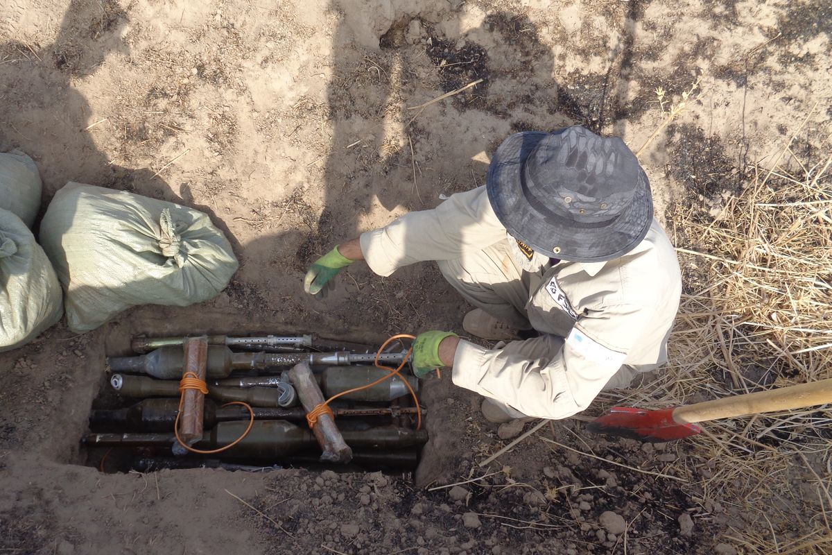 Preparation for a controlled explosion of obsolete weapons and ammunition in Tajikistan