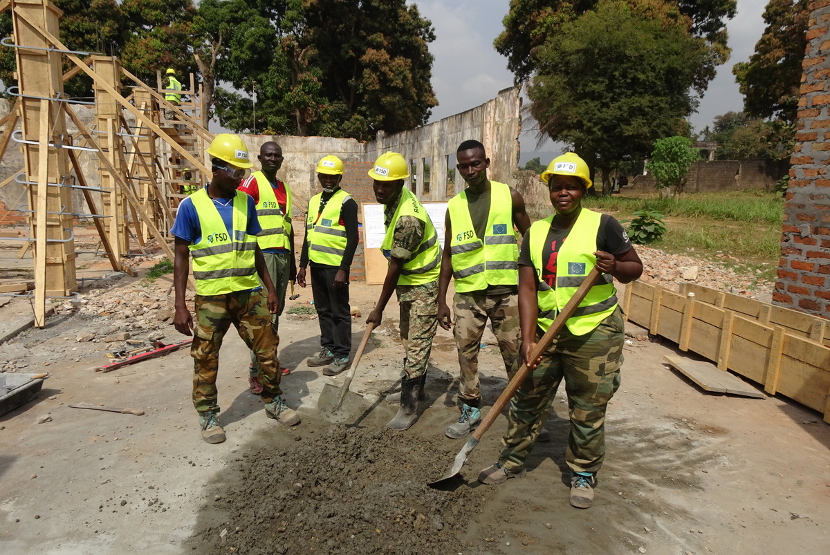 Central Africans working on a construction site and taking part in the country's rehabilitation efforts.