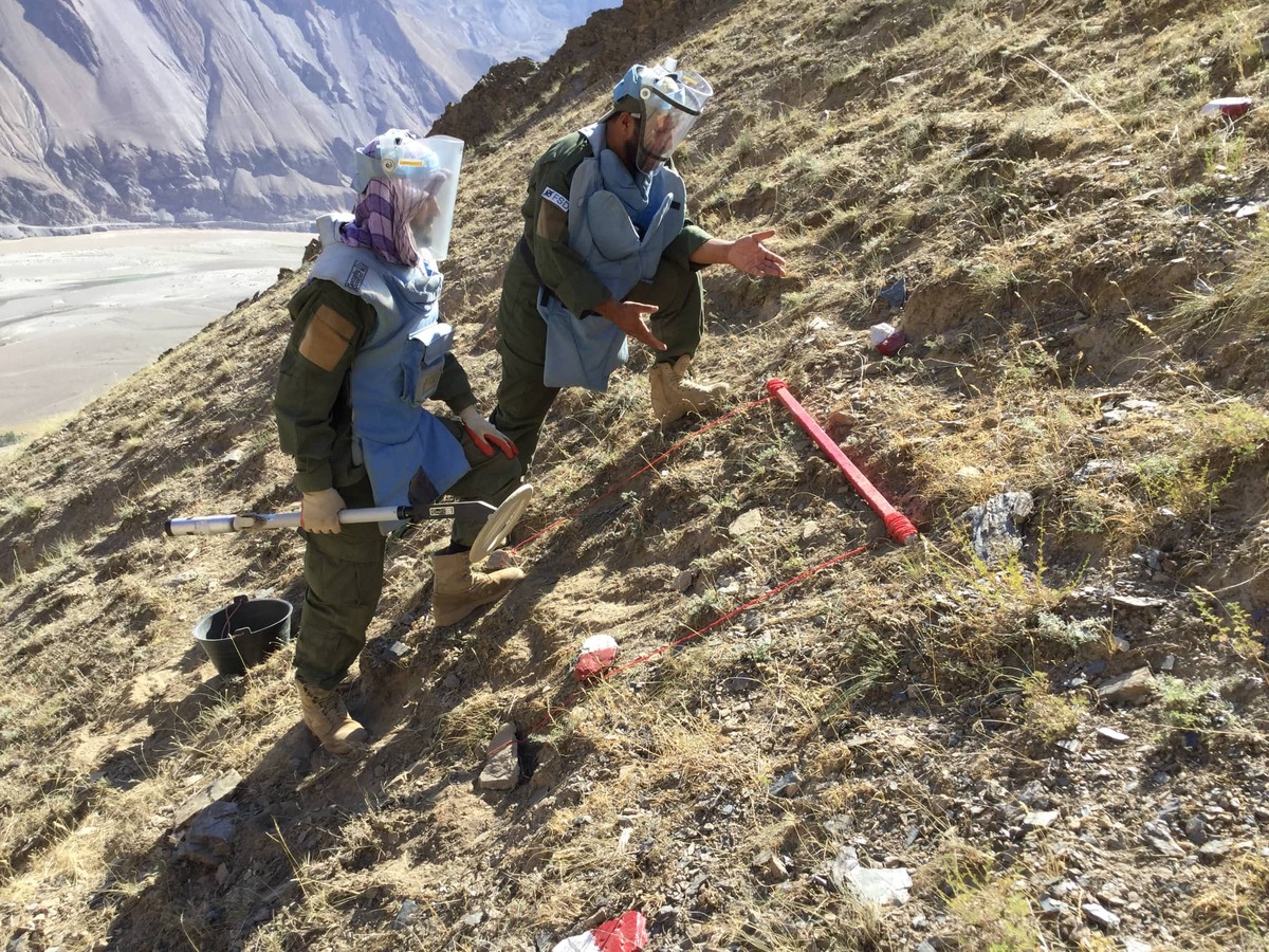 Two deminers on the mine clearance line in Afghanistan