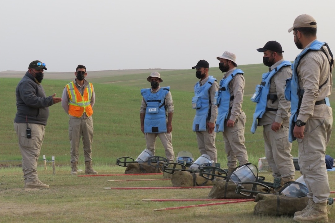 FSD team leader conducting a site safety brief before clearance can begin in Iraq