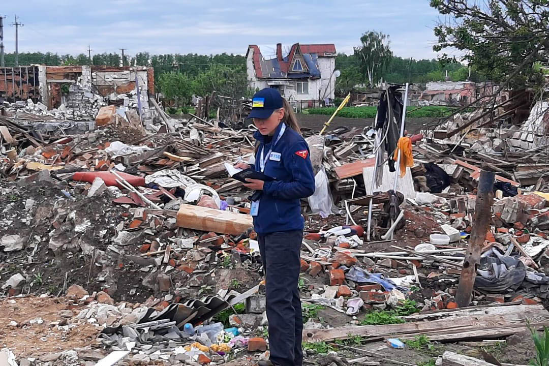 FSD team member conducting a non technical survey in rubble in Chernihiv province, Ukraine